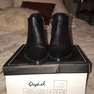 Snakeskin ankle bootie